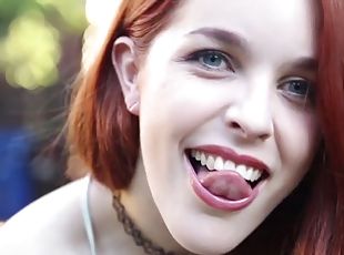 Smoking is an erotic treat when this redhead does it