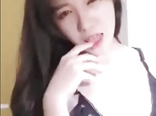 Sexy asian babe playng with pussy at web