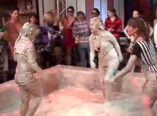 Hot lesbos show their mud covered bodies at a sex party