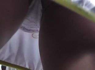 Leggy beauty with nice ass being upskirted outdoors