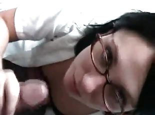 Cock stroking teen takes a facial on her glasses