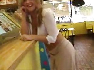 Cute blonde in public wearing almost nothing