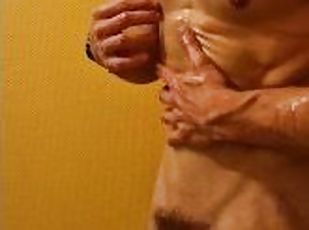 Boy a little too excited by his oiled body cums hard after rough handjob