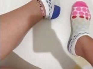 Wife pissing on her socks playing in pee