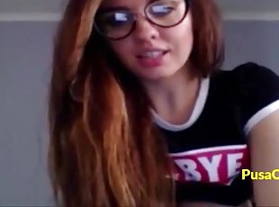 Huge natural tits brunette teen with glasses and long hair is teasing and playing with her big tits
