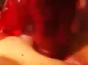 Close-up video with an anonymous GF playing with her red vibrator