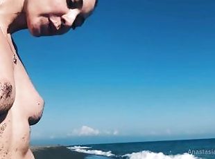 Horny teen girl looking for fuck on wild beach. Masturbation in public.
