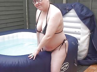 Big Tits wife in String Bikini in the Hot tub