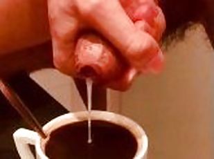 Massive cumshot in a cup of coffee
