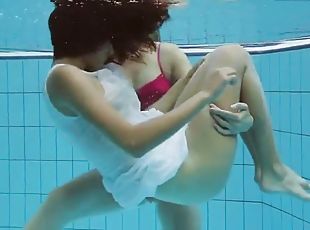 Hotly dressed teens in the pool