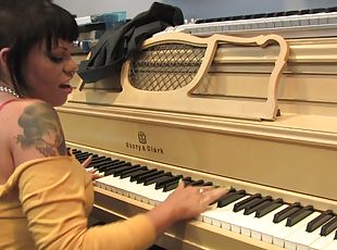 Talented sluts covered with tattoos have fun in the music studio