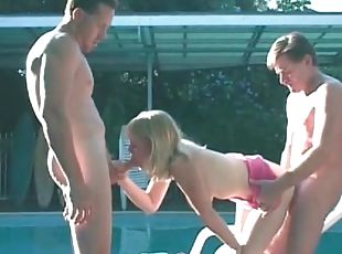 Standing doggystyle threesome with blonde teen