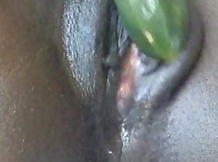 HOT EBONY SQUIRTS ALL OVER CAMERA USING COLD CUCUMUBER