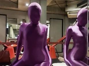 Mistress in Purple Zentai gives him Handhob to cum
