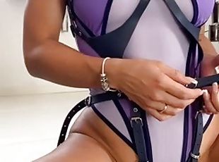 Latina in purple suit gets her pussy fingered