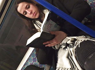 Girl read book in London metro