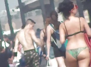 Nice young woman in green bikini voyeur clip