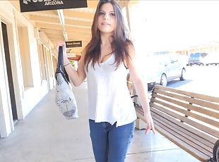 Out in public she pulls her jeans down and shows some ass