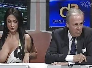 Huge tits girl on Italian news program