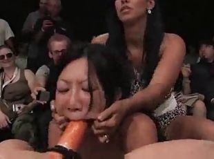 Four chicks wrestling and strapon fucking