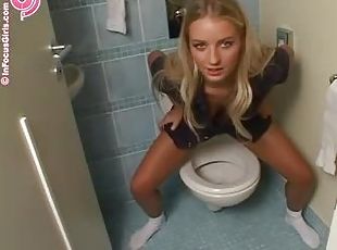 Beautiful Girl Taking A Piss In The Toilet.