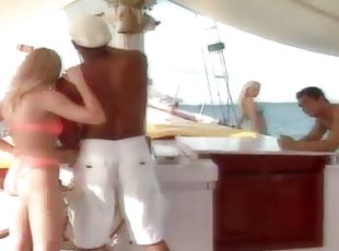 Two couples having great sex on a sailing ship in the middle of the ocean