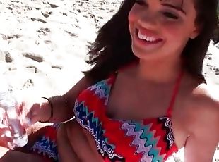 Cute amateur in bikini looks sexy on the beach