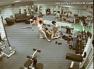 Threesome banging in the gym, watching themselves in bunch of the mirrors around