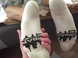 His warm, sweaty socks against my cock made me cum