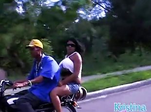 Huge boobs babe rides a motorcycle in public