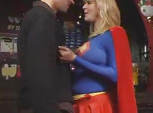 Supergirl has big tits and takes his cock
