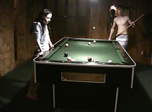 Amateur couple playing pool and having sex on the pool table