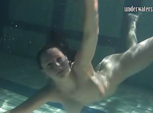 Anna Siskina loves to swim around the pool completely naked!