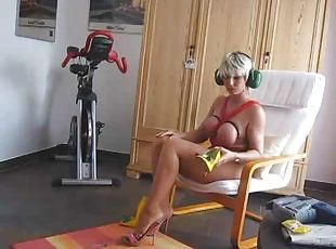 Blonde milf changes into a kinky outfit