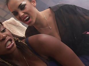 In the garage a white girl and black girl have interracial lesbian sex