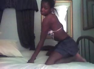 Black teen in skirt shakes it on webcam