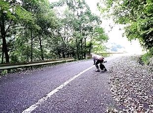 Masturbating with a dildo on the old road.