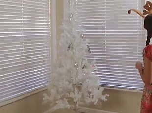 Mom and stepdaughter decorate more than the x-mas tree