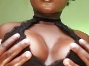 ebony slut shows her big pointy tits